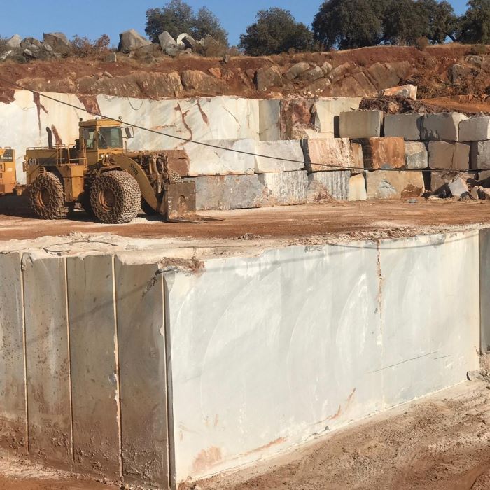 Quarry face with marble appearing just a few meters below surface