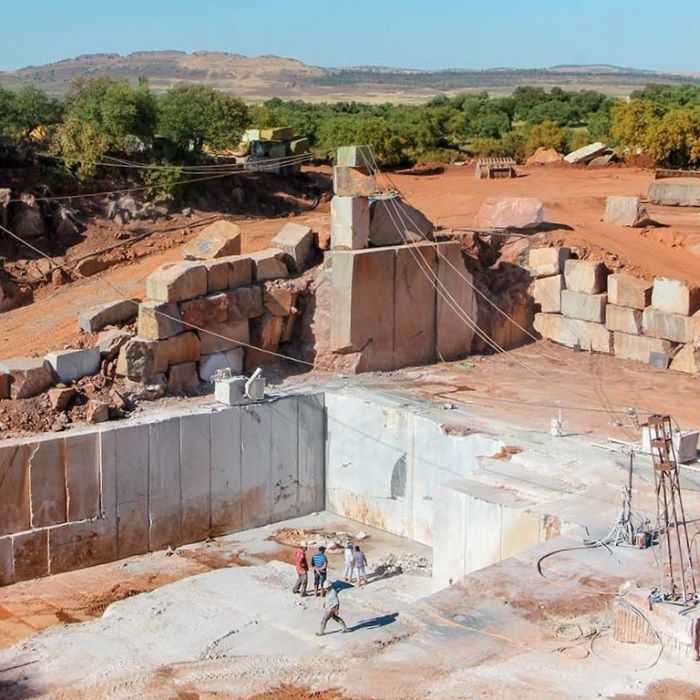 View of the marble quarry for sale in Alconera, Spain, with open faces and easy extraction thanks to hilly terrain, ensuring a higher than average ROI